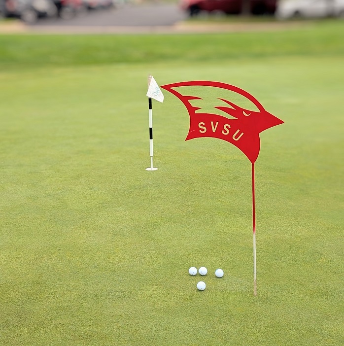 SVSU yard sign on the putting green